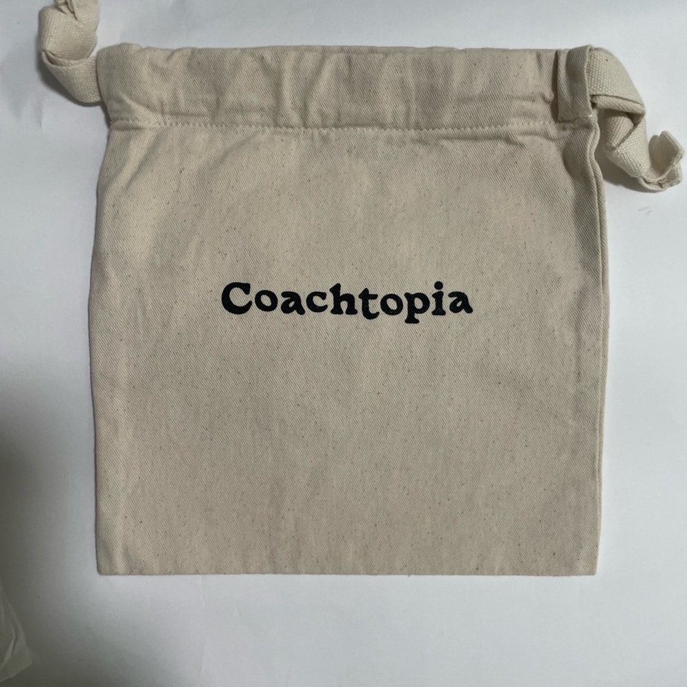 Coach Cream Drawstring Pouch